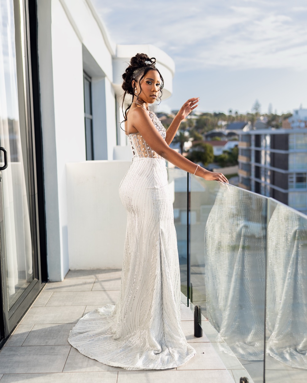 Evening gown photoshoot on a balcony overlooking Port Elizabeth