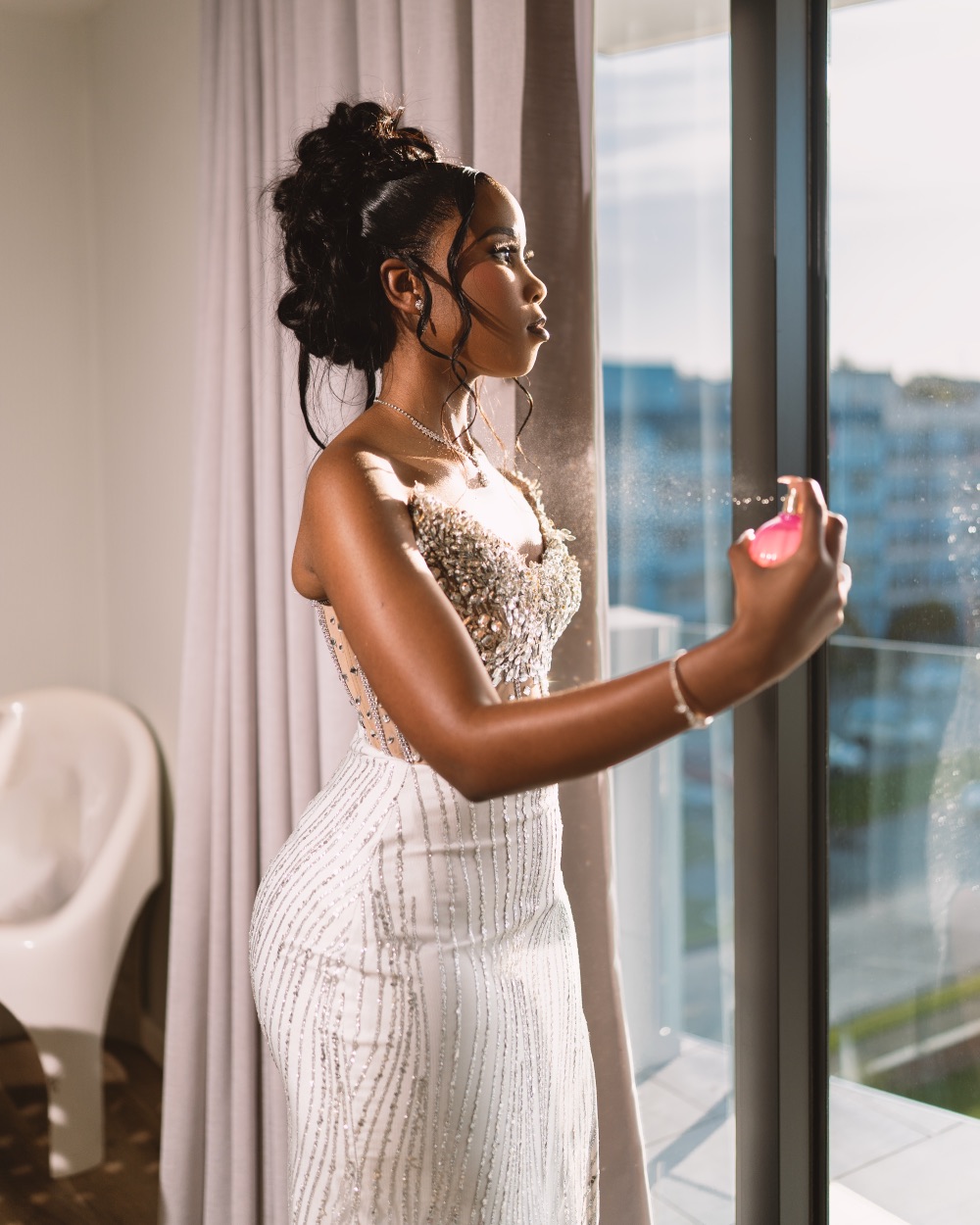Matric dance getting-ready photoshoot by the window in golden light, Gqeberha photographer